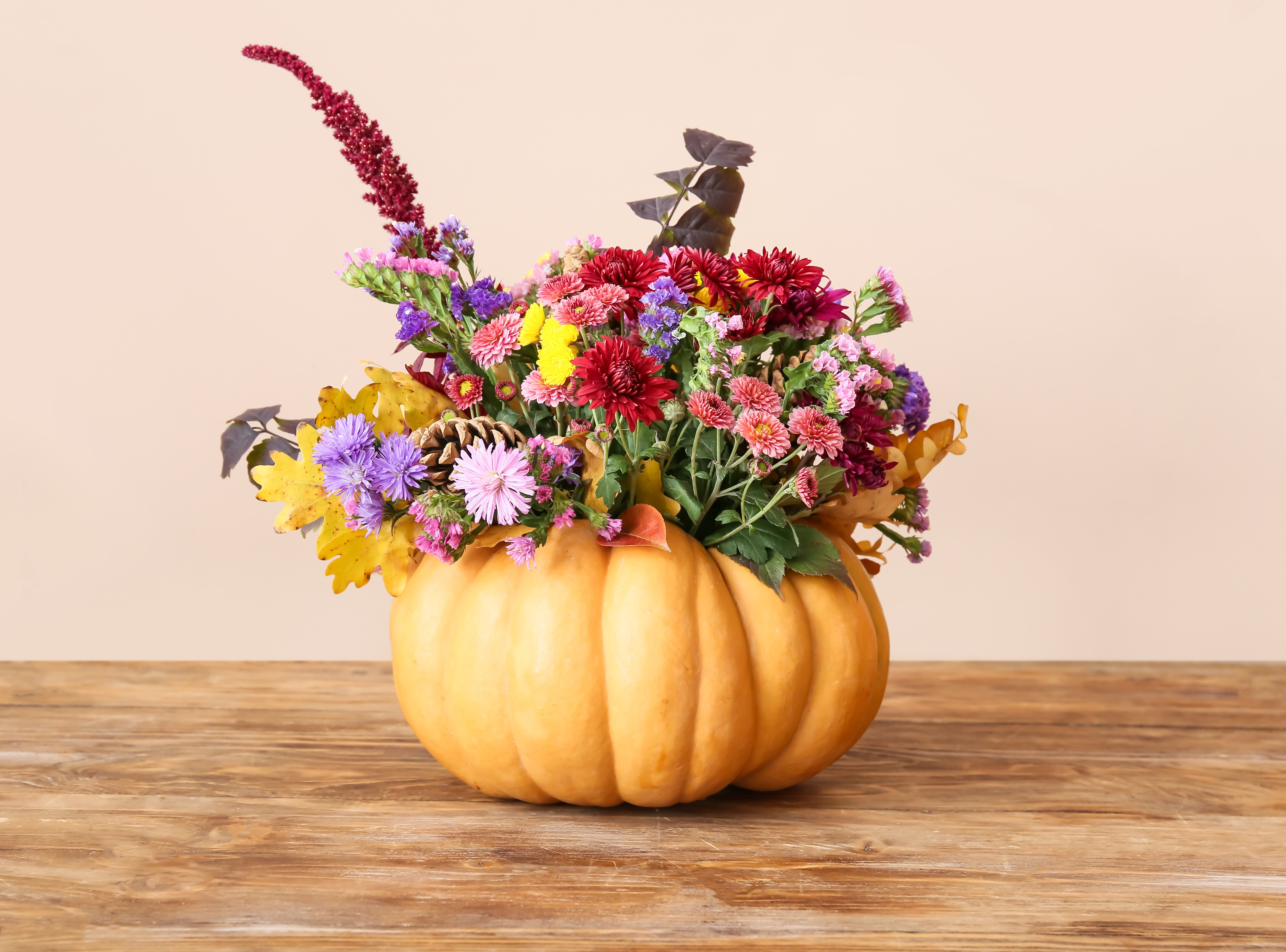 flower arrangement in pumpkin