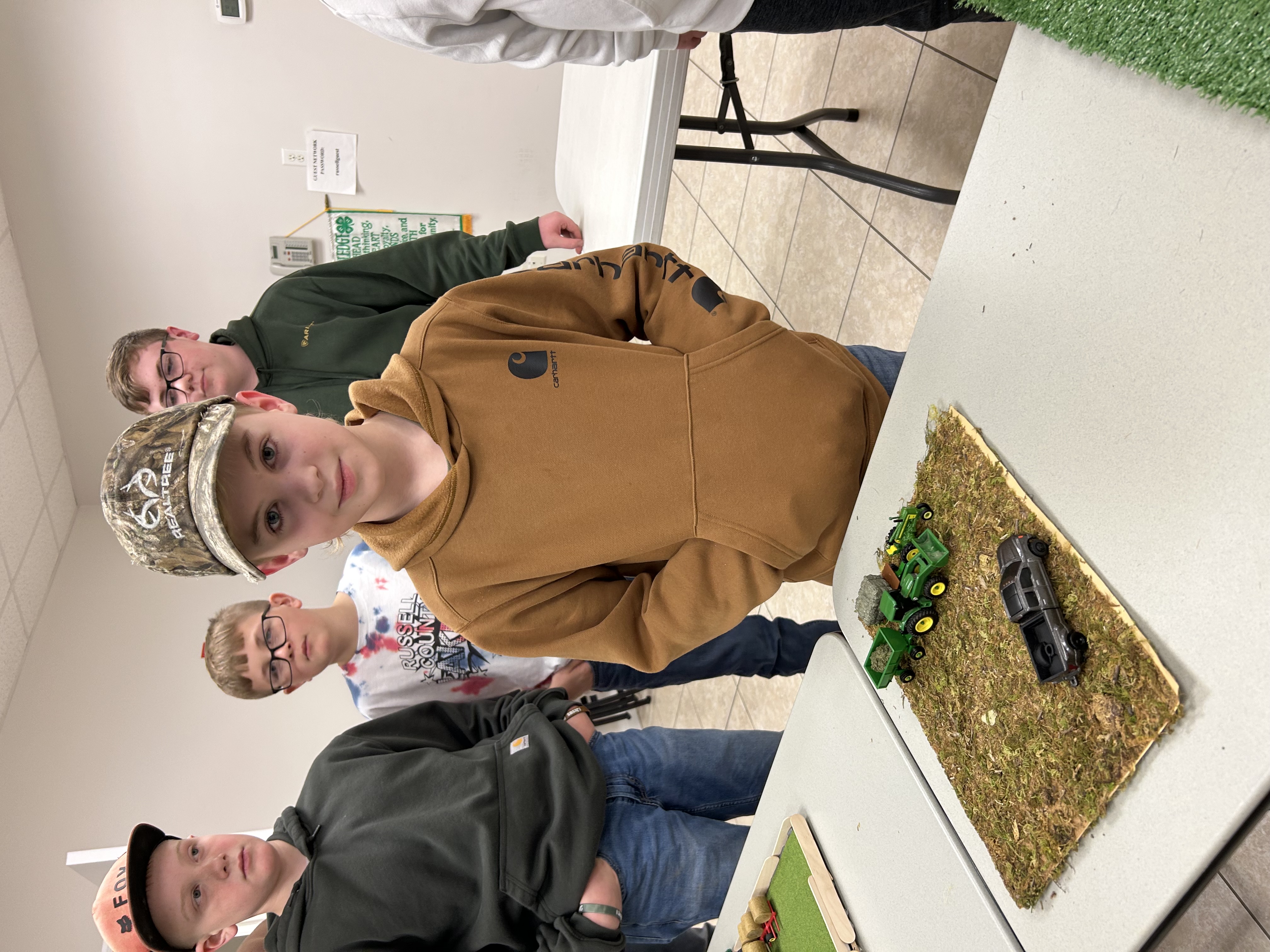 Boy with farm toys