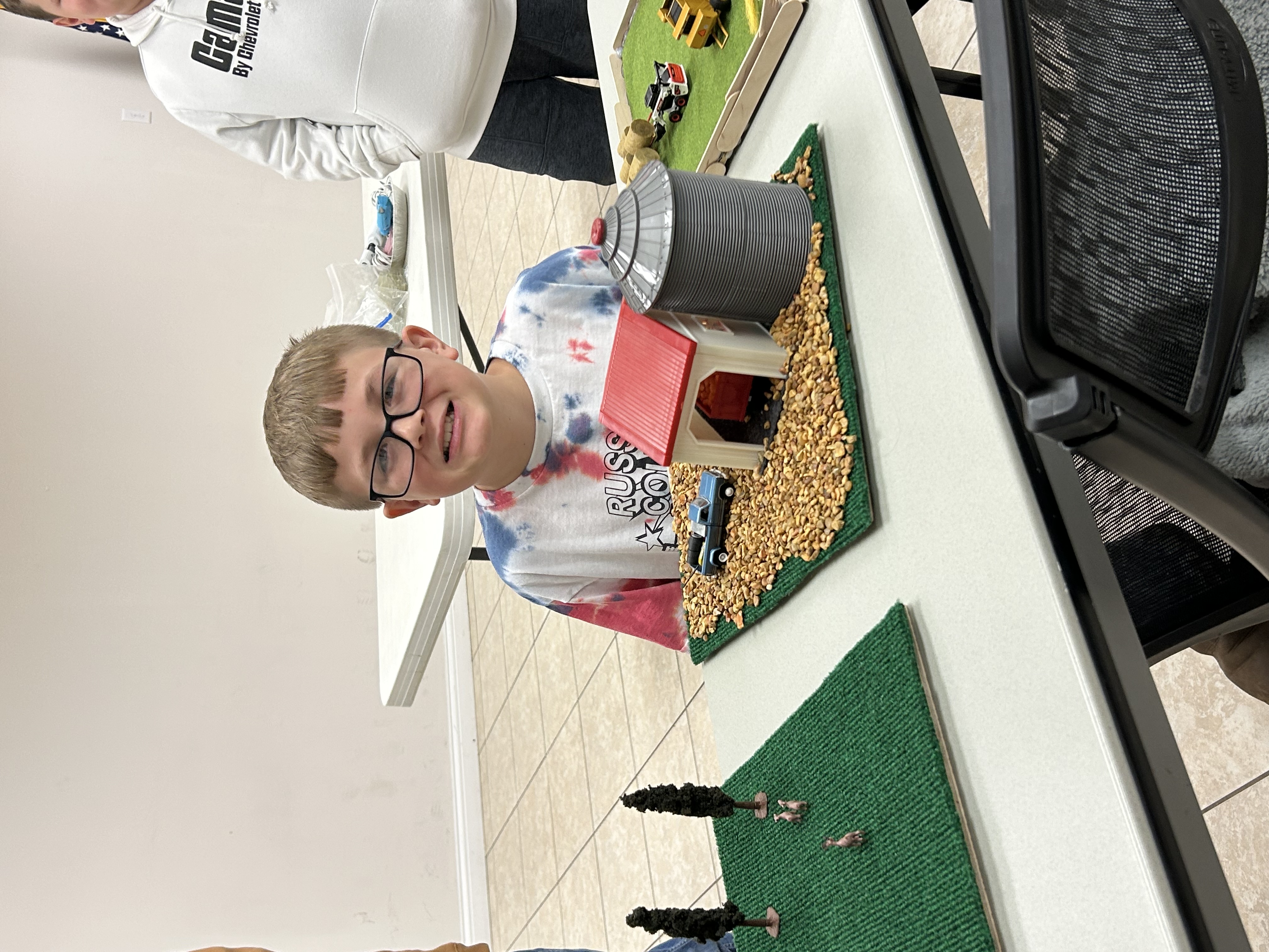 Boy with farm toys