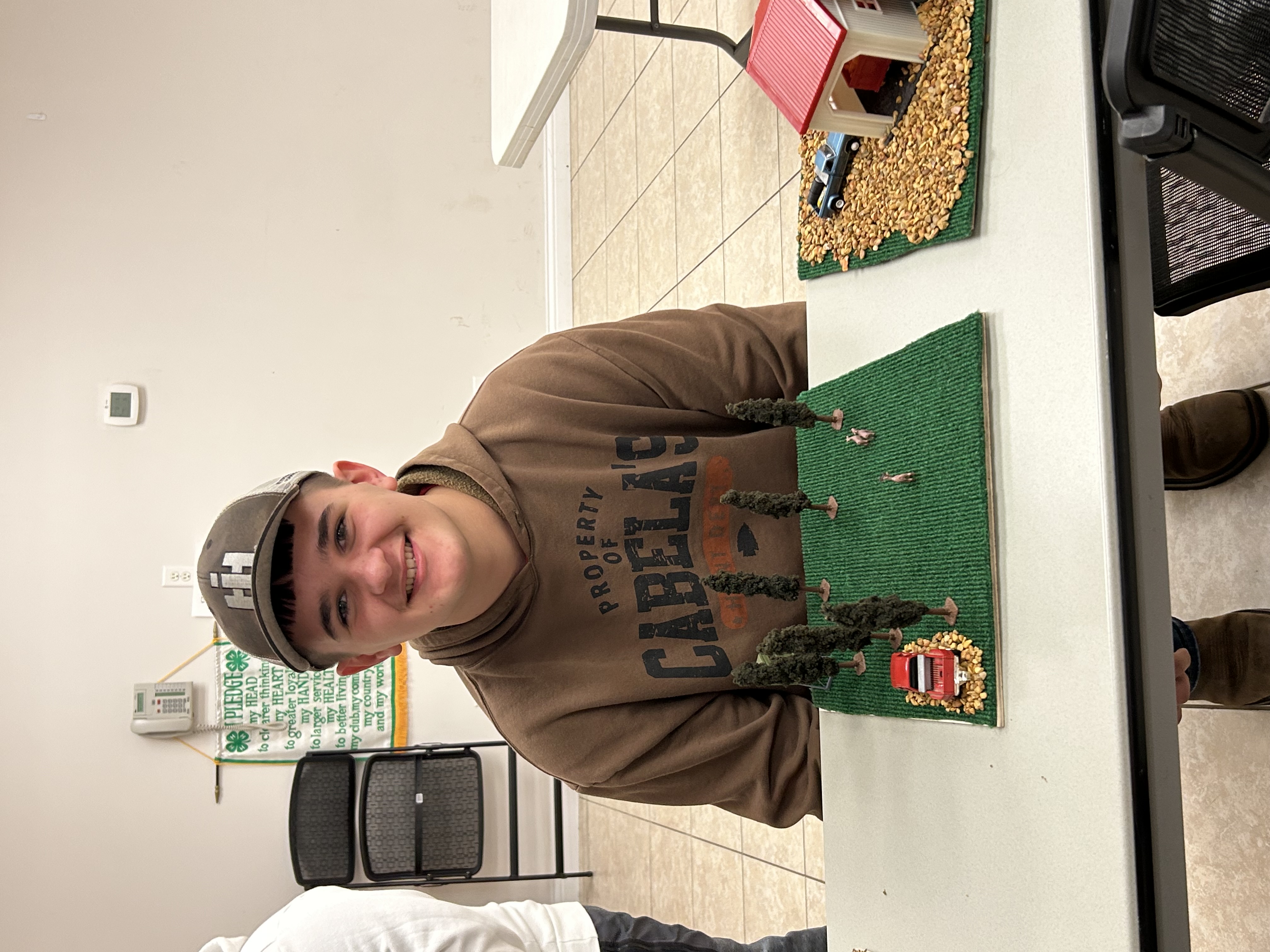 Boy with farm toys