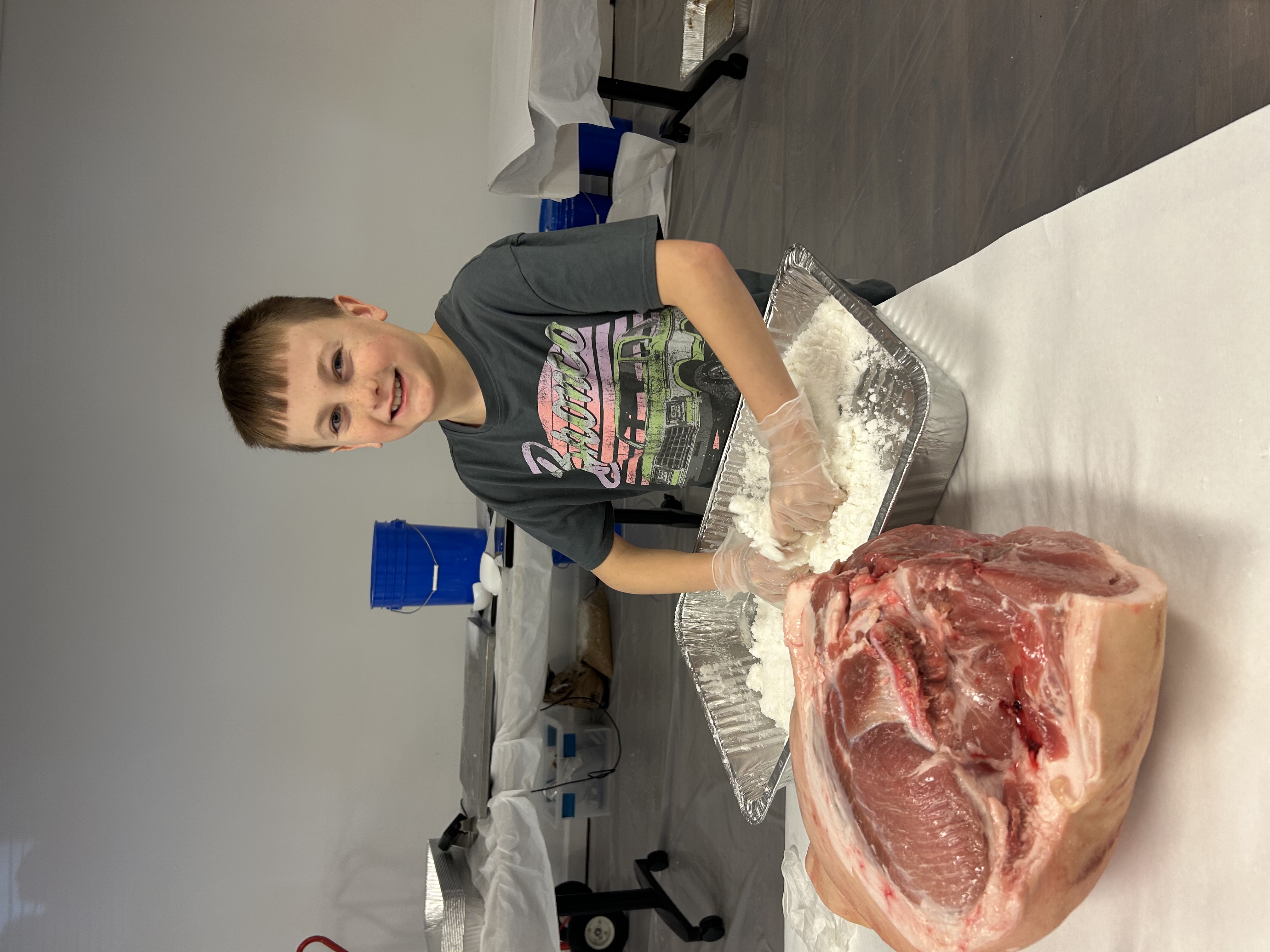 Boy curing country ham