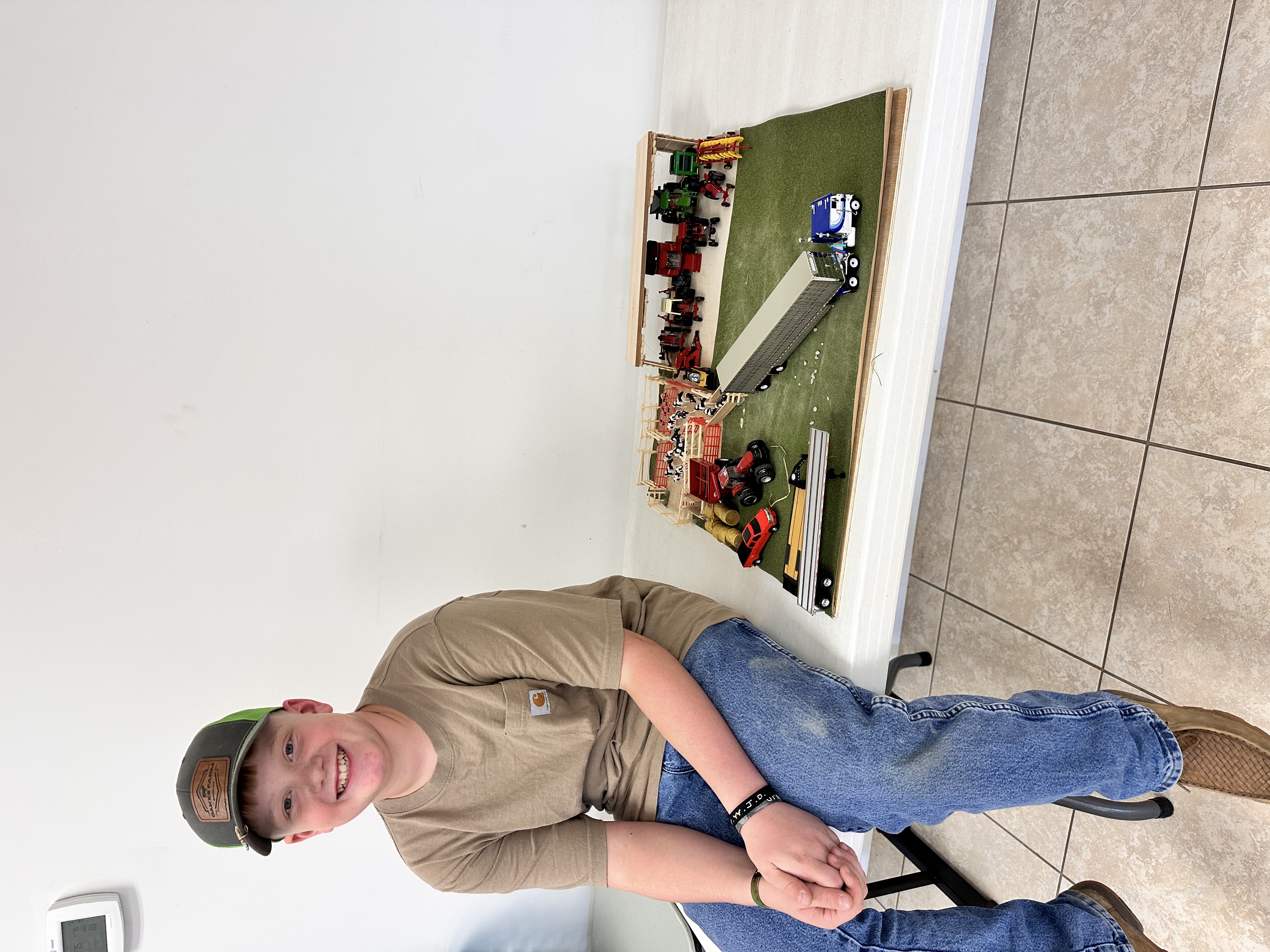 Boy with farm display
