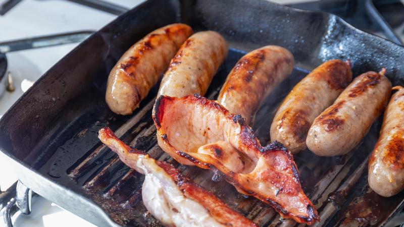 bacon and sausage in skillet